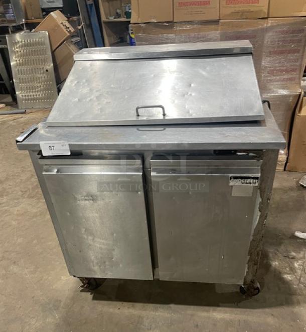 Cool-Tech stainless steel 2-door refrigerated prep table, model Custom-36BMB, 36" wide, on casters. Used condition.