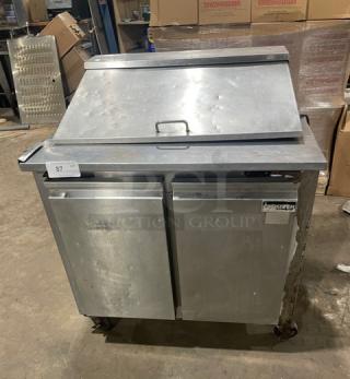 Cool-Tech stainless steel 2-door refrigerated prep table, model Custom-36BMB, 36" wide, on casters. Used condition.
