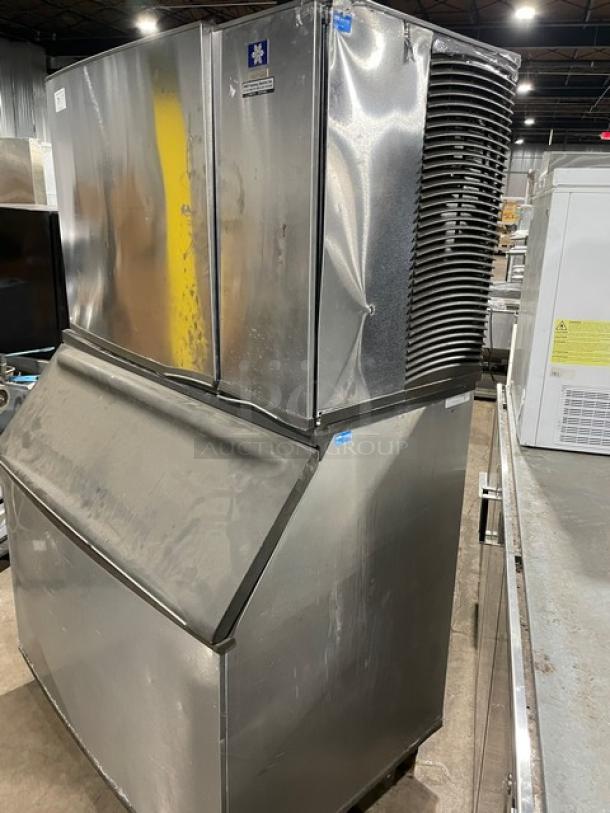 Manitowoc SY1804A/B970 stainless steel ice machine, air-cooled, lift-open lid, on legs, 208-230V, 1 phase, commercial use.