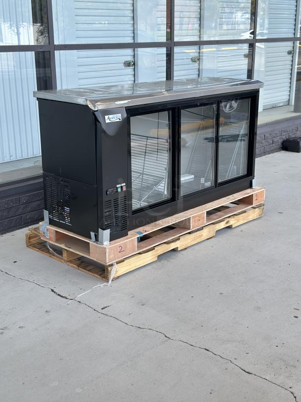 Avantco UBB-72S-HC 73" black bar refrigerator; sliding glass doors, LED lighting; front top edge crushed, door misaligned.