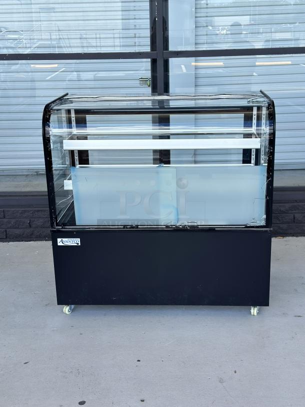 Avantco BCD-48 black bakery display case, 48" wide, curved glass, visible scratches, and dents. Serial: 1684904180038.