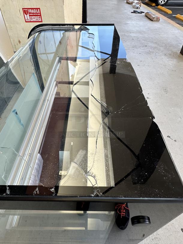 Avantco BCD-48 48" dry bakery display case with broken curved glass, black finish, 1 phase, 115V, serial 1684904180038.