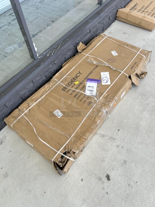 Regency 30" x 72" equipment stand, model 600ES3072GK, brand new, scratch and dent, in original packaging.