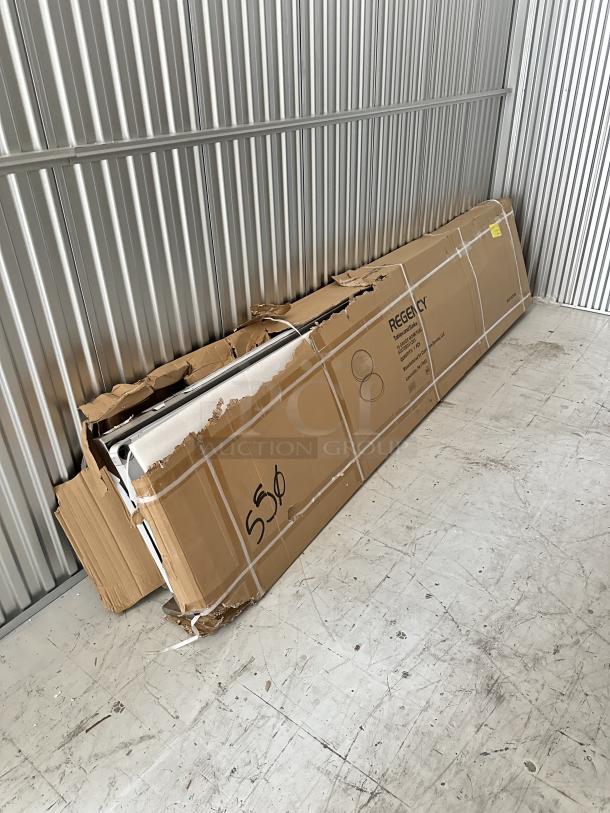 Brand new Regency 24"x120" stainless steel work table, model 600TSB24120S, in distressed box with possible dents.