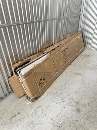 Brand new Regency 24"x120" stainless steel work table, model 600TSB24120S, in distressed box with possible dents.