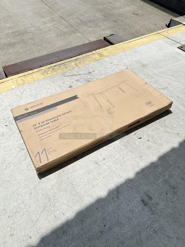 Lancaster Table & Seating outdoor table, 63x32", pearl white, model 164RD326WHT. New, in original packaging, scratch and dent.