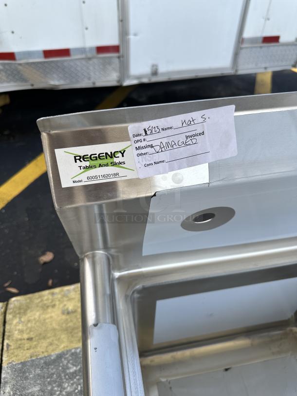 Regency sink with right drainboard, model 600S1162018R, scratch and dent condition, visible label marked "DAMAGED".