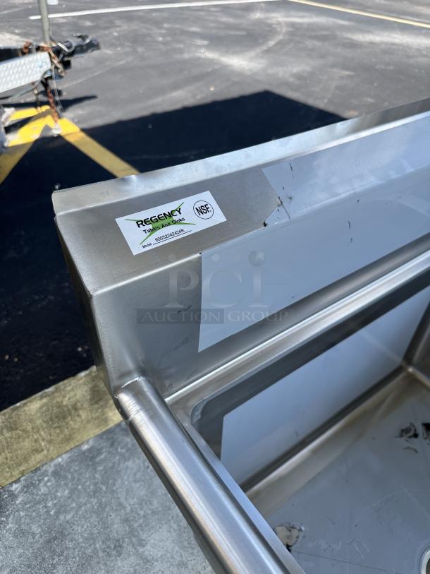 Brand new Regency 600S2242424R two compartment commercial sink, scratch and dent, with right drainboard, NSF certified.