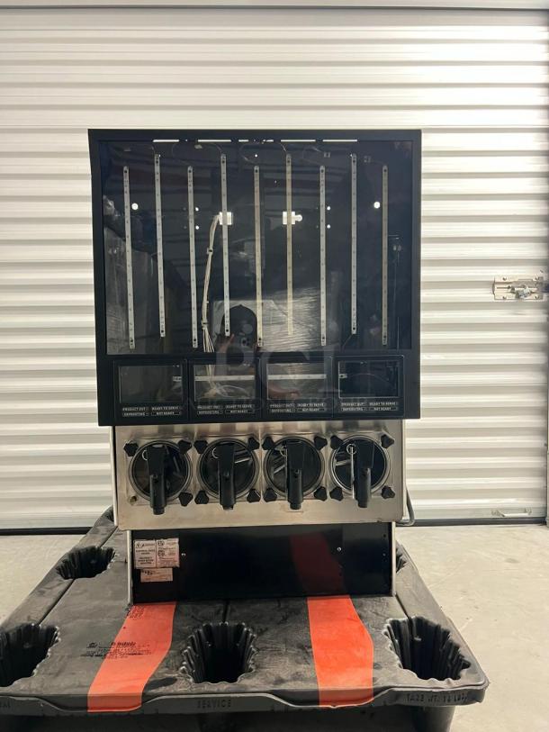 Frozen Beverage Dispensers, 77X Series, features multiple nozzles, stainless steel finish, visible control panel, excellent condition.