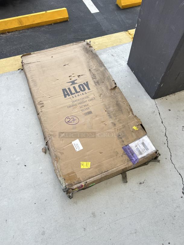 Brand new Alloy Silver Dining Table, model 164DA3263SIL, 32"x63", scratch and dent condition, packaging damaged.