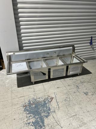 Regency 3-compartment sink, model 600S3162018L, with left drainboard; new, scratch and dent condition.