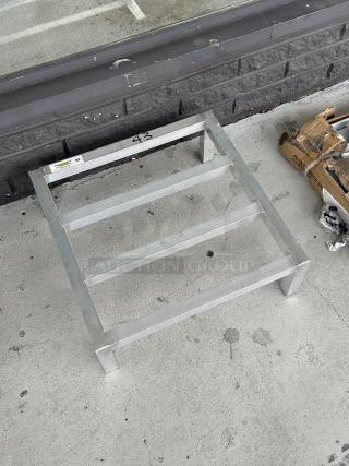 Regency 24"x24"x8" aluminum dunnage rack, model 600DUN24248, brand new with scratches, 1,500 lb capacity, visible label.