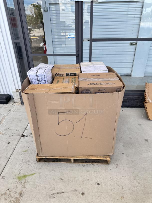 Mixed pallet with paper hot cups, plastic cold cups, portion cups, and sandwich bags. Boxes labeled with product details.