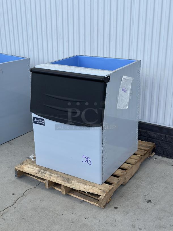 Avantco BIN27530 30" ice storage bin, 375 lb. capacity, in new condition on pallet. Black lid, visible Avantco logo and model number.