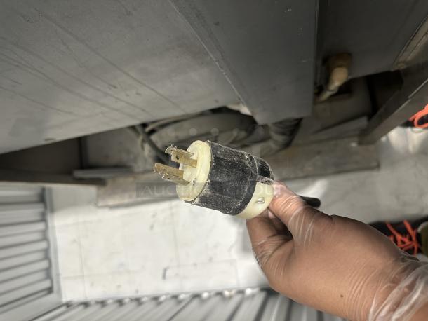 Close-up of plug from Alto-Shaam QC3-40 Rapid Chill Ref/Frz. Serial W1152874-1. Used condition.