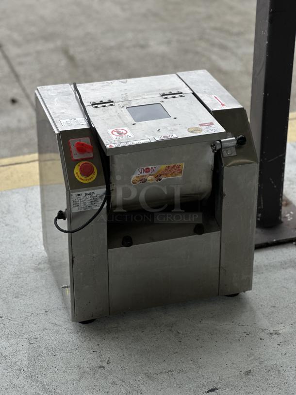 Snoby commercial dough mixing machine, stainless steel, used condition, visible control panel, brand logo, and safety labels.