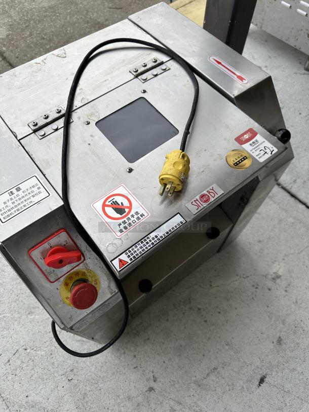 Snoby commercial dough mixing machine with visible control dials, safety labels, and power cord; used condition.