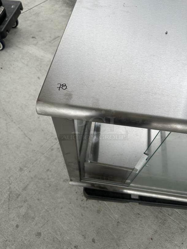 Stainless steel food display warmer case, used condition, glass panels, small surface scratches, marked with number "78."