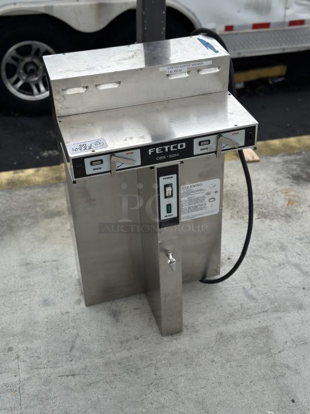 USED! Fetco CBS-52H automatic coffee brewer, 120/208-240V, stainless steel, visible labels, functional condition.