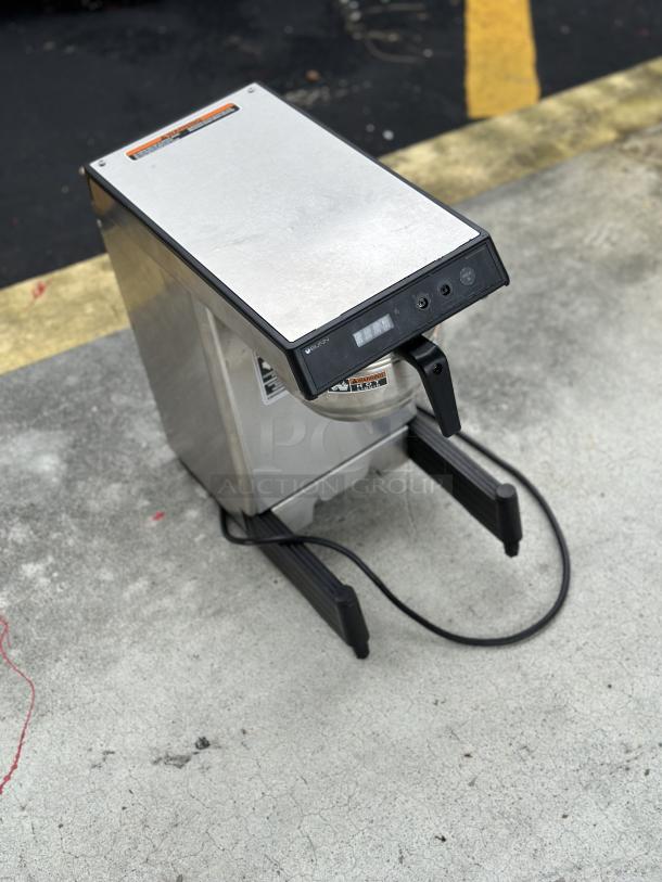 USED BUNN 39900.0005 Combination Coffee and Tea Brewer; visible wear, digital controls, sleek stainless steel body.