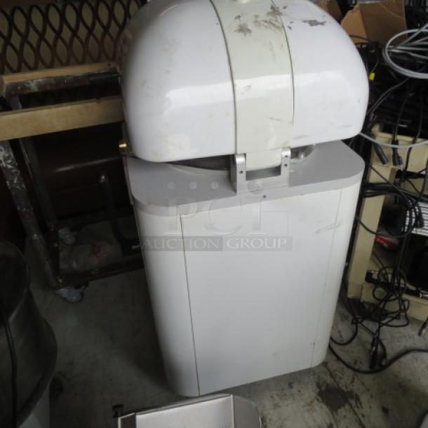 Univex Dough Divider Rounder MBDR11 on casters, 220V, 3 Phase. Good condition, visible wear.