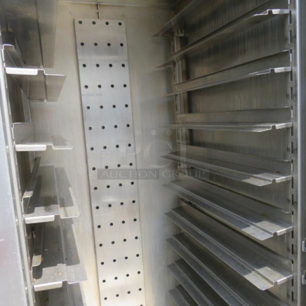 Carter Hoffman mobile heated cabinet, Model HL2-18-96, with shelving and casters, in working condition, 120 Volt.