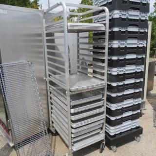 Aluminum speed rack on casters, 20.5x26x69 inches, no pans included, used condition. Suitable for commercial kitchens.