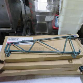 NEW Metro SWD18K3 green wall mount shelf bracket, shown unpacked. Includes original packaging and part labels.