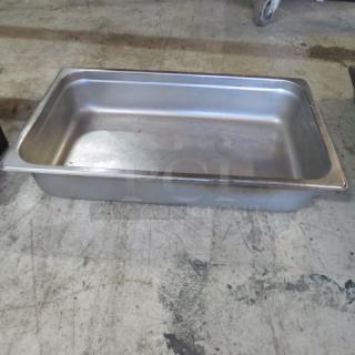 Full-size 4-inch deep hotel pan, stainless steel, used condition, minor surface scratches. Ideal for catering or restaurant use.