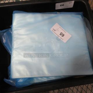 Blue food sealing bags in a bin, labeled "66 QTY," suitable for various storage needs.