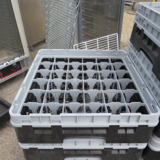 Cambro 36 Hole Dishwasher Rack, model 2XBID, in good condition. Stackable design suitable for commercial use.