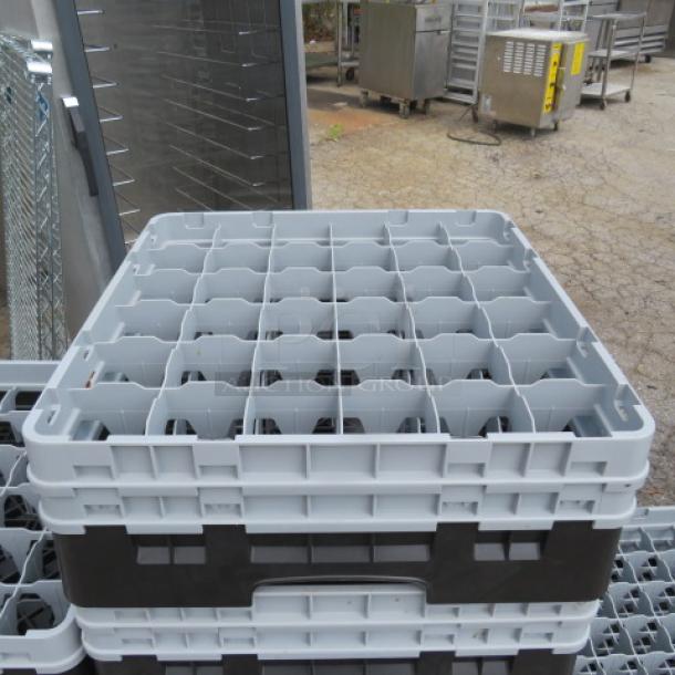 Cambro 36 Hole Dishwasher Rack, gray plastic, durable, clean condition, suitable for efficient dishwashing needs.