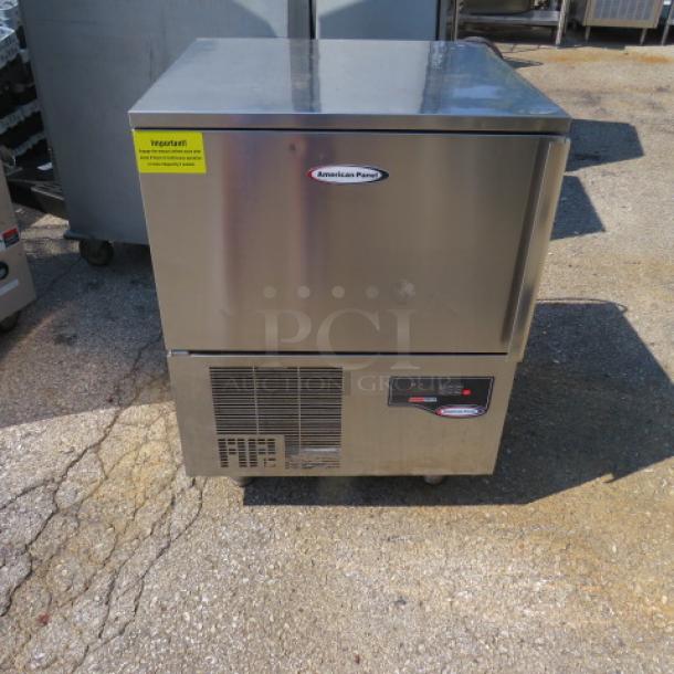 American Panel Blast Chiller, Model AP3BCF30-1-D, with probe on casters, 120V, 25.5x26x35 inches, in good condition.