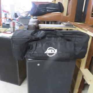 Black ADJ equipment bag, featuring a durable design and brand logo. Suitable for safely transporting audio gear.