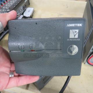 Ametek Powervar 1.5 Battery Backup, model #ABC150-11, in used condition. Features power indicators and brand logo.