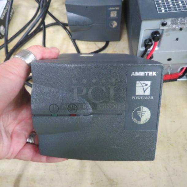 Ametek Powervar 1.5 Battery Backup #ABC150-11, compact design, brand logos visible, in good condition.
