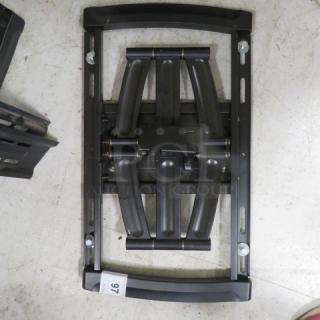 Heavy-duty TV wall mount, black metal, adjustable arms, excellent condition, includes mounting hardware.