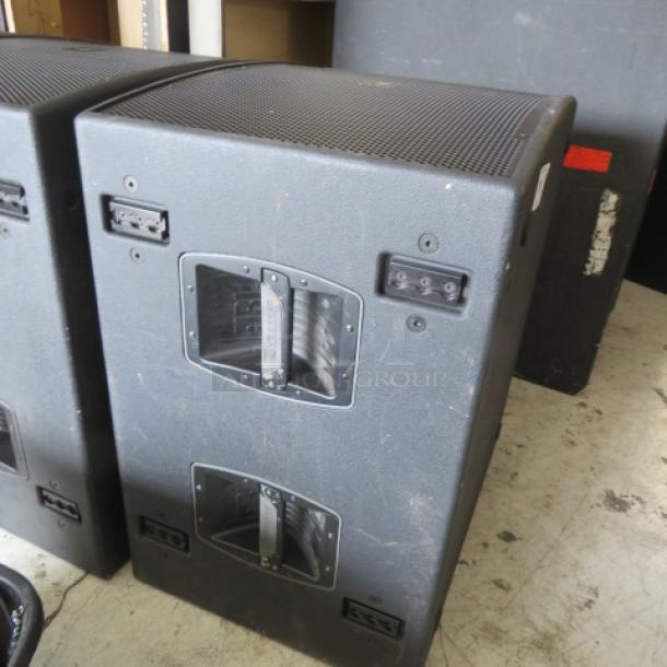 JBL VP Series Speaker, black, dual handles, visible wear, robust construction, ideal for professional audio setups.