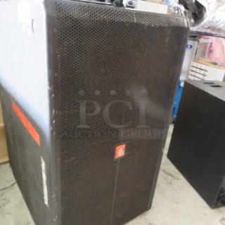JBL SRX700 speaker, used condition, black mesh grille, visible brand logo.