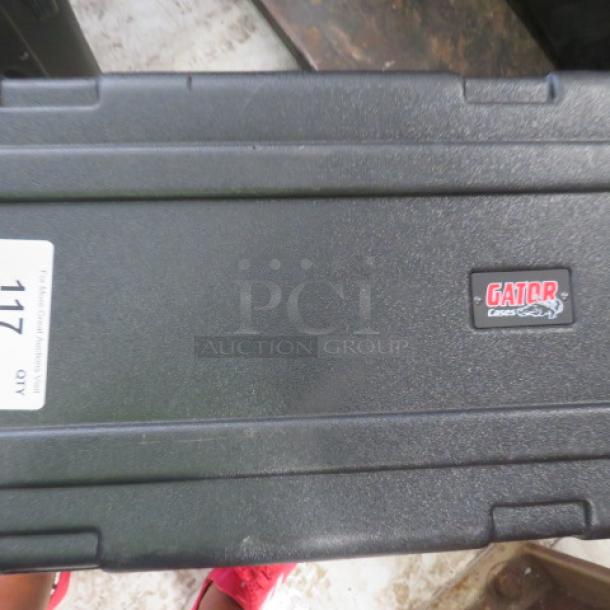 Black Gator case with two drawers, sturdy construction, Shure branding. Features visible Gator Cases logo and label marked "1172."
