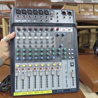 Soundcraft Signature 10 Mixer, 8 channels, good condition, features built-in effects, visible channel labels, $465.00.