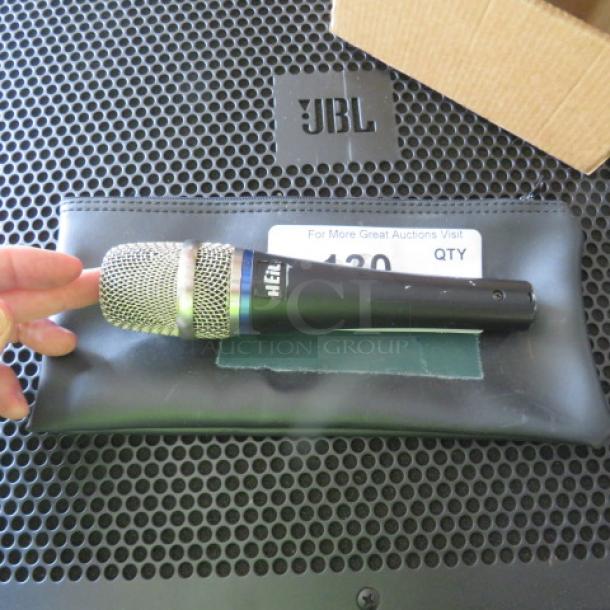 Heil microphone with silver mesh head and black handle in good condition, placed on a black zipper bag.