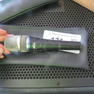 Heil microphone with silver grille, black body, logo visible, placed on black zipper bag. Excellent condition.
