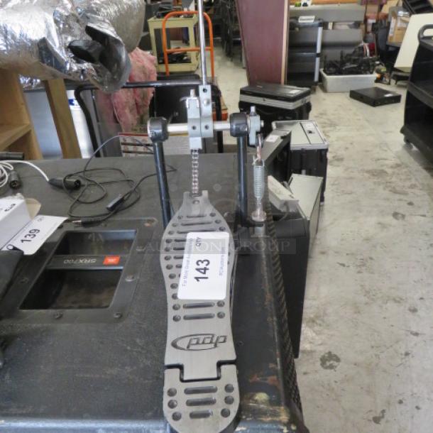 PDP drum pedal, chain-drive, metal design. Good condition. Auction tag "143" visible.