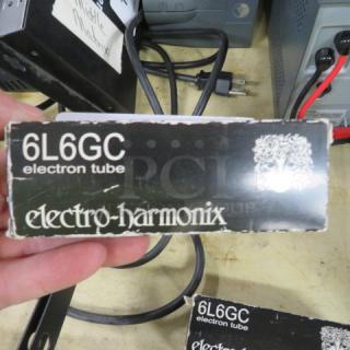 NEW Electro Harmonix 6L6GC electron power vacuum tube in original box, showing brand and model labels.
