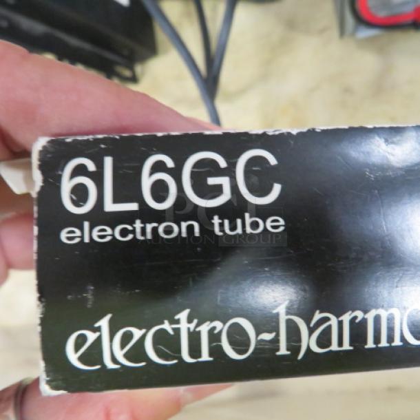 Electro Harmonix 6L6GC electron power vacuum tube, new in box. Model 6L6GC label visible, indicating make and model.