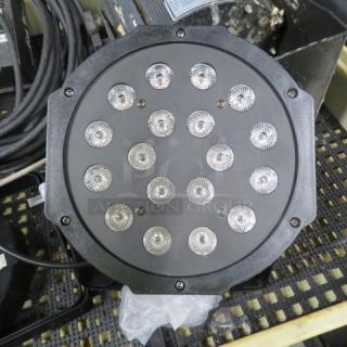 Round stage light with 18 LED bulbs, black casing. Good condition, suitable for professional lighting setups.