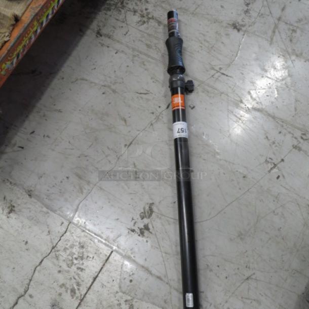 JBL Professional Telescoping Speaker Pole, model JBLPOLE-GA, shown on a concrete floor. Features automatic raising.