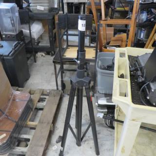 One Pro Line Speaker Stand LS-T2BK, adjustable, black, with numbered label. Appears in good condition in warehouse setting.