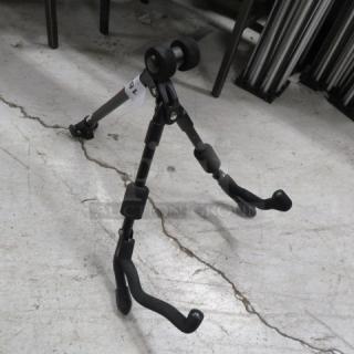 Pro Line stand, adjustable tripod with rubber feet, used condition. Suitable for music instruments or equipment support.